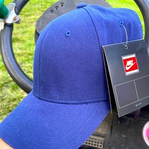 Nike dark blue, and I don’t know the size